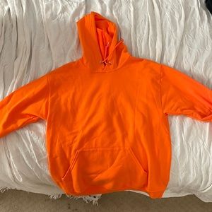 Plain neon orange hoodie. Great condition. Worn about twice, reach out!